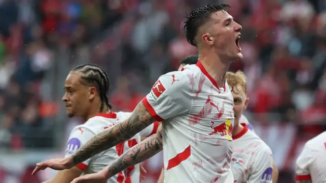 Benjamin Sesko celebrates after a goal by RB Leipzig