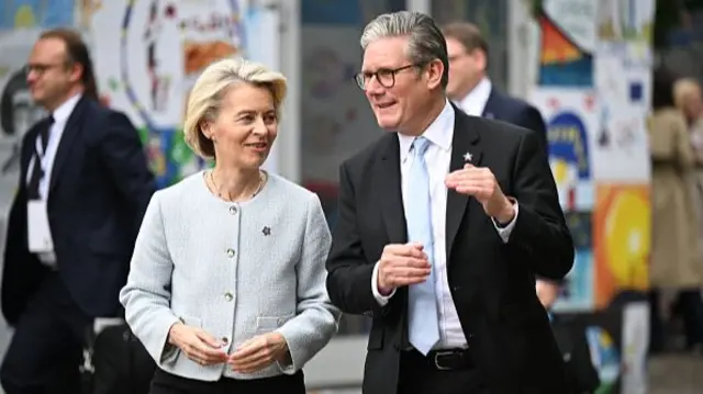 Ursula von der Leyen, President of the European Commission and Keir Starmer, Prime Minister of the United Kingdom greet each other, ahead of their bilateral meeting