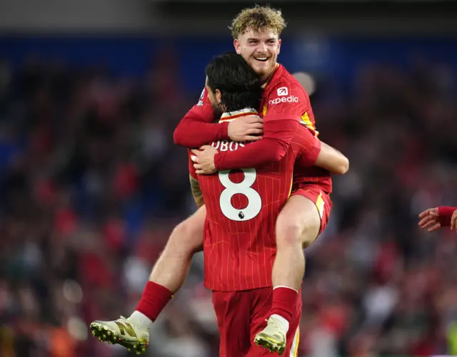 Liverpool's Dominik Szoboszlai celebrates scoring their side's second goal of the game with Harvey Elliott