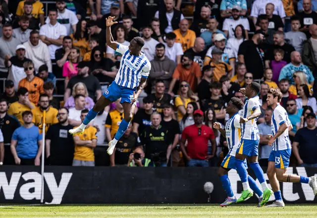 Danny Welbeck jumping in the air while celebrating