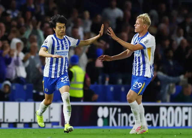 Brighton & Hove Albion's Kaoru Mitoma celebrates scoring their second goal
