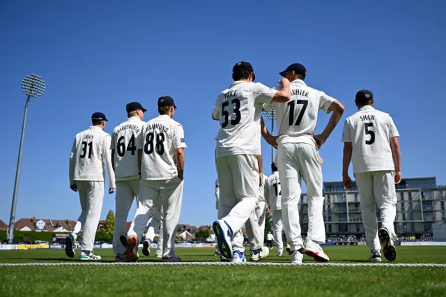 Gloucestershire players entering the pitch to field at Bristol against Kent