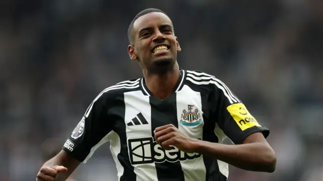 Alexander Isak celebrates scoring a goal for Newcastle