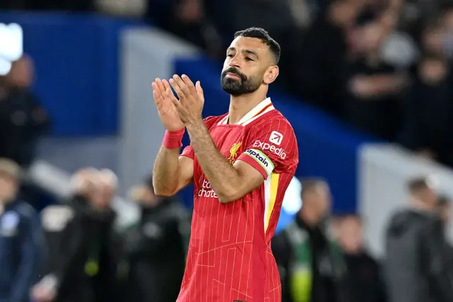 Mohamed Salah of Liverpool acknowledges the fans