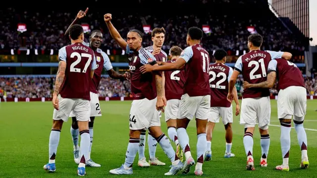 Aston Villa players celebrate