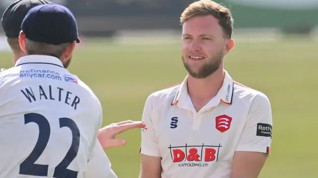 Sam Cook celebrates wicket