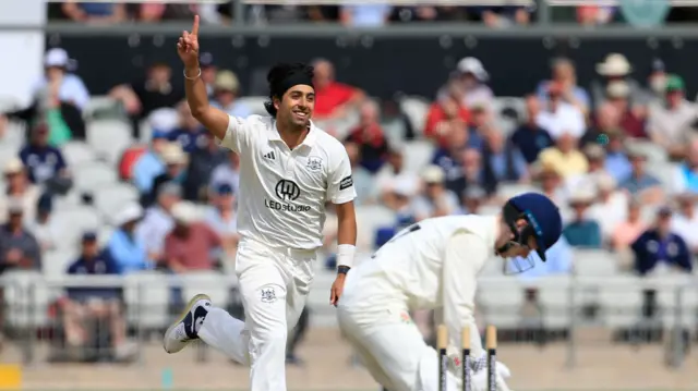 Ajeet Singh Dale celebrates bowling George Bell