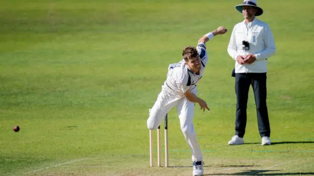 Ben Coad bowling for Yorkshire