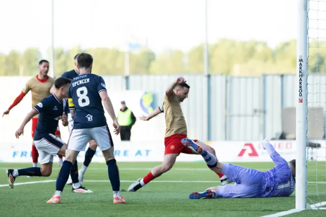 Scott Robinson scores