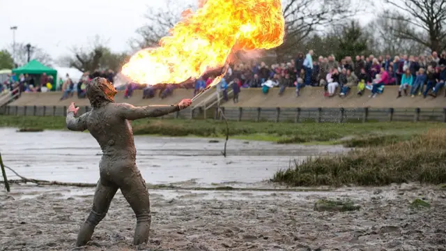 A competitor blew a ball of fire