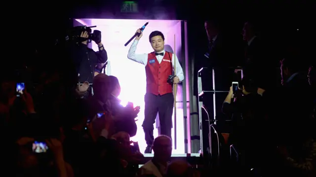 Ding Junhui waves to the Crucible crowd during the 2016 final