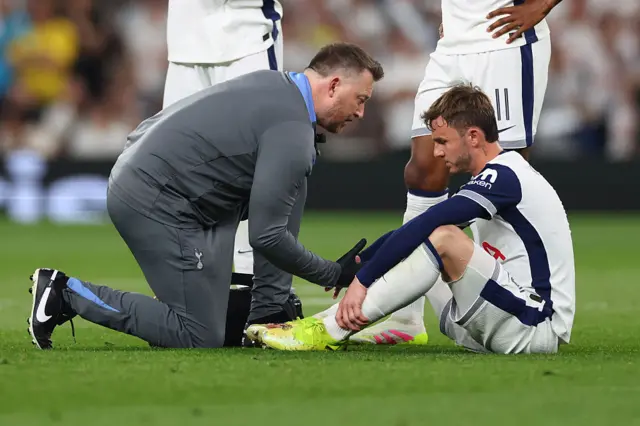 James Maddison treated by Spurs physio