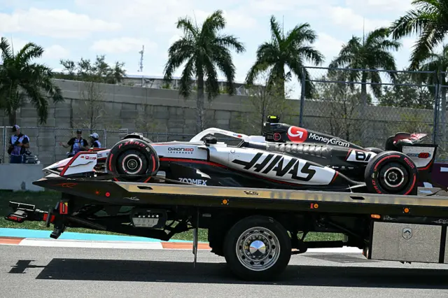 Oliver Bearman's car is taking back to the Haas garage on the recovery truck
