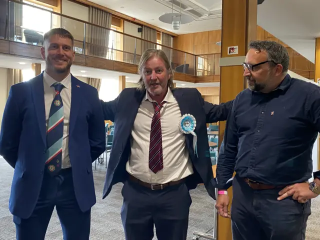 Dr John Doddy pictured in the middle