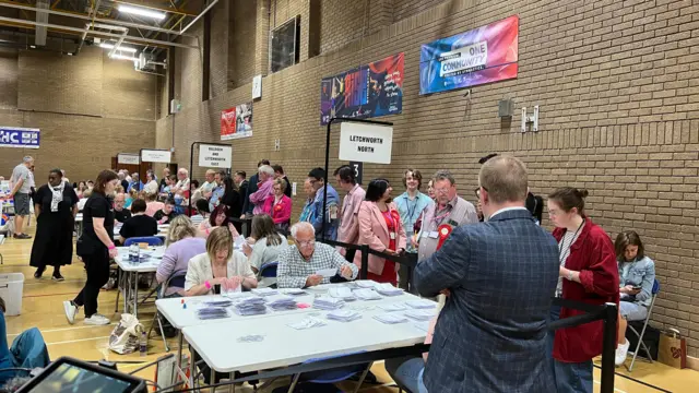 Election count in Hertfordshire, a large number of people by tables