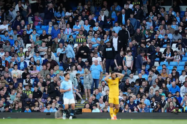 City fans head into the Etihad after protest