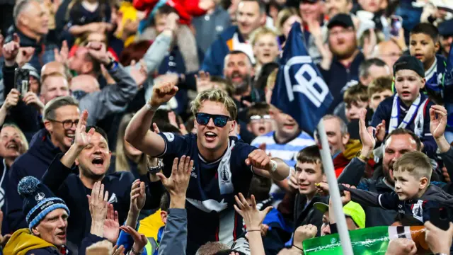 Falkirk's Ethan Ross celebrates with fans