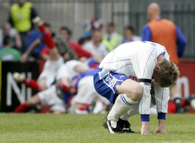 Alan Mannus saved Dungannon's fifth penalty from Mark McAllister to secure another trophy for Linfield in 2007