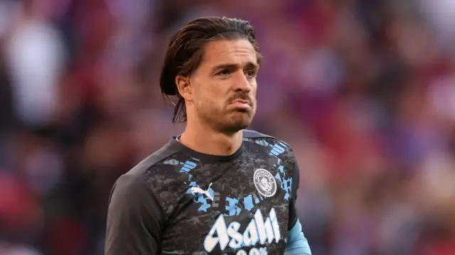 Manchester City's Jack Grealish warms up before the 2025 FA Cup final