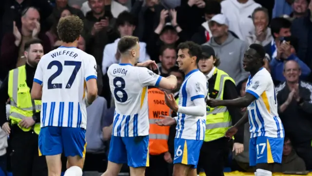 Brajan Gruda congratulates Yasin Ayari after he scores for Brighton against Liverpool