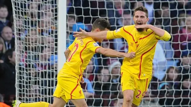 Fabio Borini of Liverpool celebrates after scoring against Aston Villa