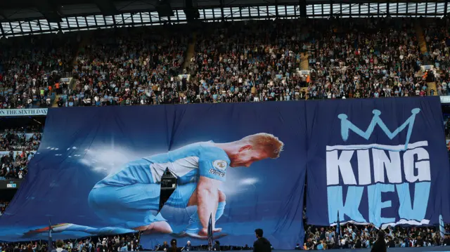General view of a giant banner of Manchester City's Kevin De Bruyne