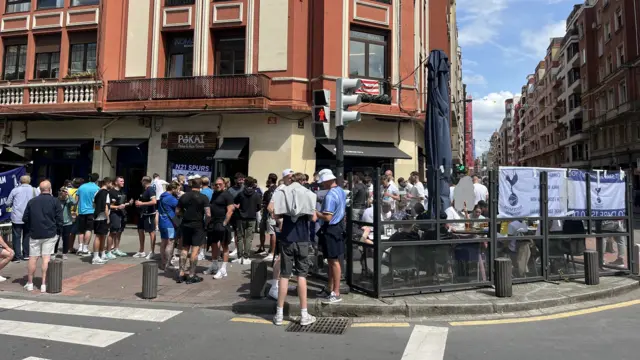 Fans gather outside a pub in Bilbao