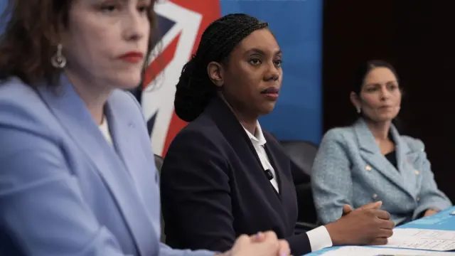 Shadow secretary of state for environment, food and rural affairs, Victoria Atkins, Conservative Party leader Kemi Badenoch and shadow foreign secretary Dame Priti Patel sat during a press conference