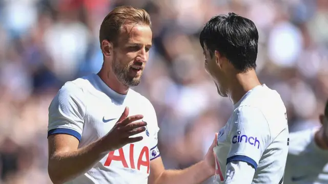 Former Tottenham player Harry Kane celebrates after scoring with Son Heung-Min