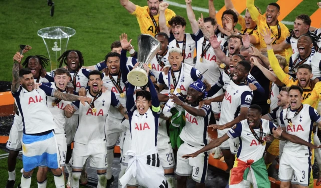 Tottenham Hotspur's Son Heung-Min lifts the Europa League trophy following his sides victory