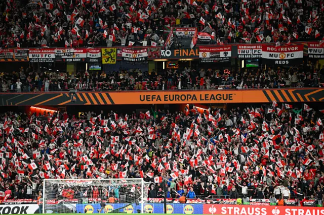 Manchester United fans cheer