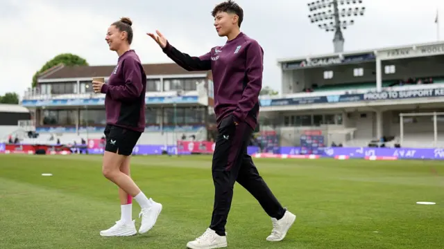 Linsey Smith and Issy Wong of England look on ahead of the 1st Women's Vitality IT20 between England and West Indies at The Spitfire Ground