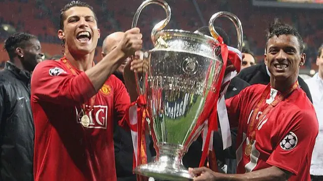 Nani and former Manchester United team-mate Cristiano Ronaldo with the Champions League trophy