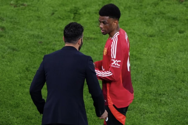 Manchester United manager Ruben Amorim with Amad Diallo