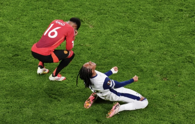 Tottenham Hotspur's Djed Spence celebrates as Manchester United's Amad Diallo sits dejected