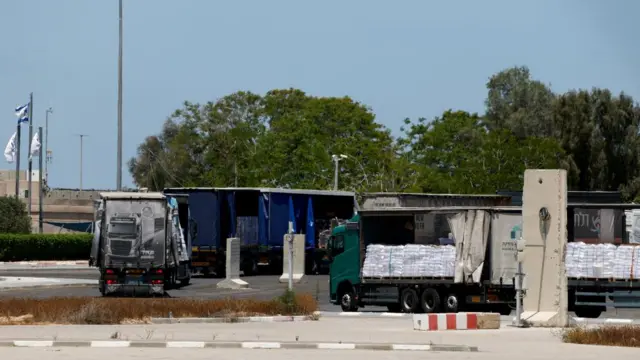 Aid trucks pictured at the Kerem Shalom crossing between Israel and Gaza