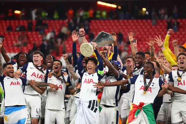 Son Heung-Min of Tottenham Hotspur lifts the trophy