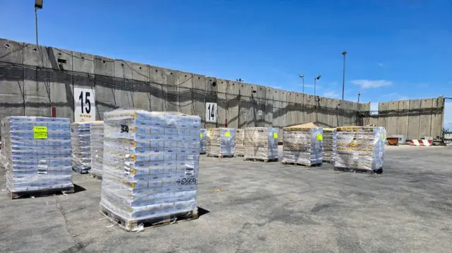 Aid stacked on the Israeli side of the border