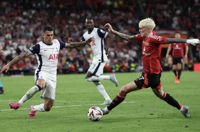 Manchester United's Alejandro Garnacho in action with Tottenham Hotspur's Pedro Porro