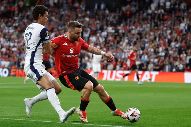 Brennan Johnson and Manchester United's English defender Luke Shaw vie for the ball
