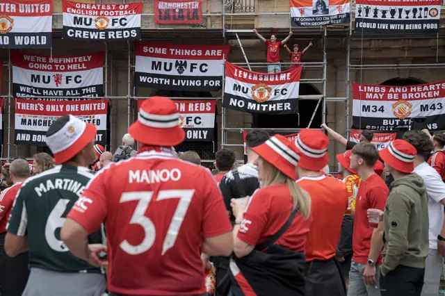 United fans gather in a square in Bilbao