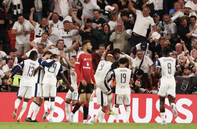 Tottenham Hotspur's Brennan Johnson celebrates scoring their first goal with teammates