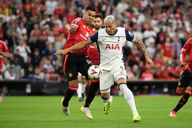 Casemiro and Tottenham Hotspur's Brazilian forward #09 Richarlison vie for the ball
