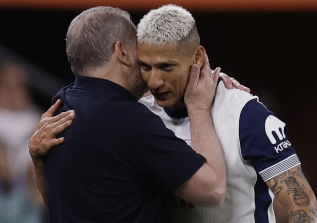 Tottenham Hotspur's Richarlison with Tottenham Hotspur manager Ange Postecoglou after being substituted