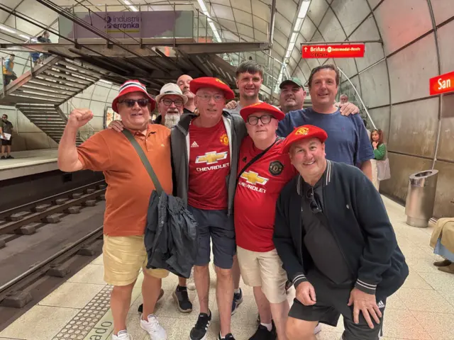 Manchester United fans on the metro