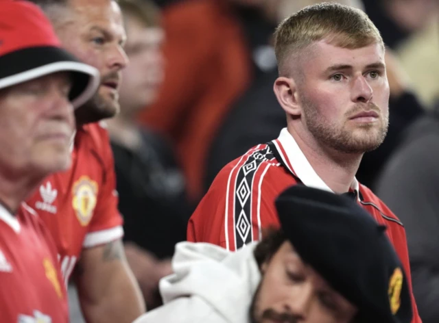 Manchester United fans look dejected