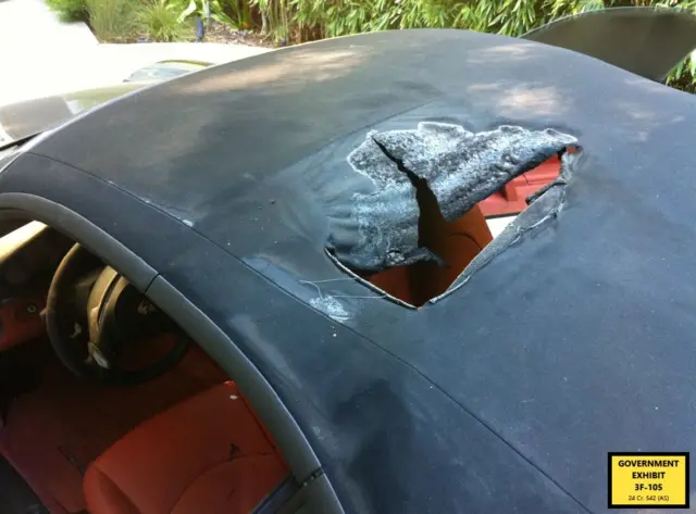 A hole in Kid Cudi's Porsche's roof where a Molotov cocktail was allegedly thrown