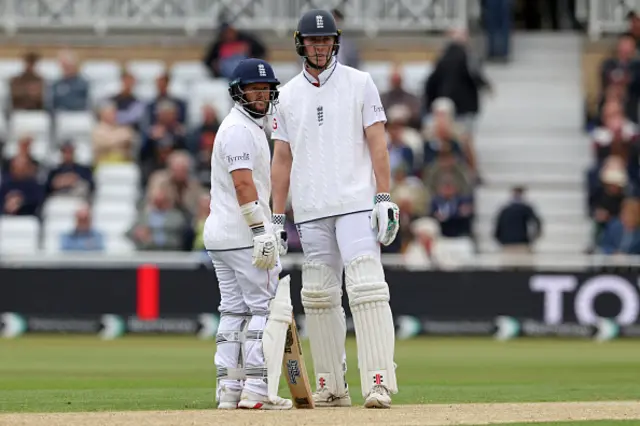 England's Ben Duckett (L) and England's Zak Crawley (R) have a discussion