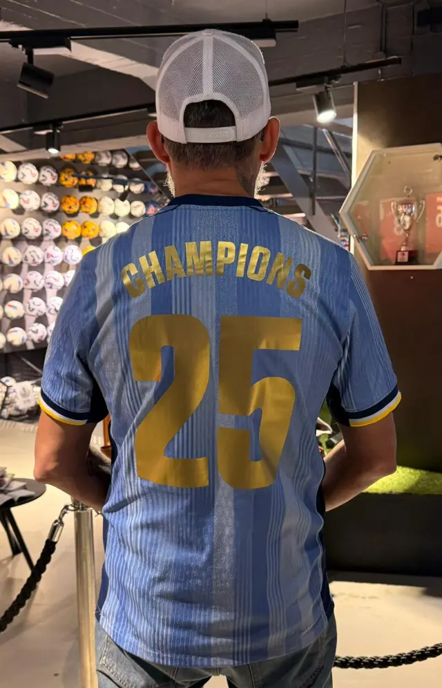 Spurs top with 'Champions' and '25'