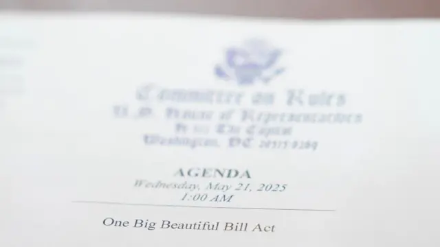 A view of an agenda with the words "One Big Beautiful Bill Act" printed on it, on the day of a House Rules Committee's hearing on U.S. President Donald Trump's plan for extensive tax cuts, on Capitol Hill, in Washington, D.C., U.S., May 21, 2025
